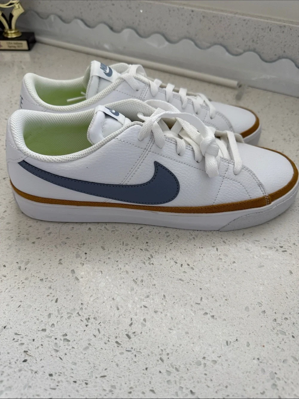 Nike Womens White Sneakers with Navy Swoosh and Tan Trim